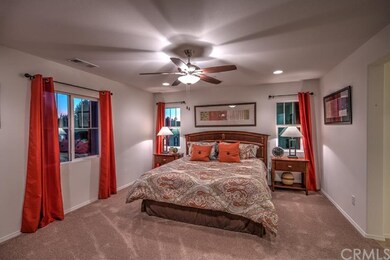Master bedroom - photo is of model and does not de