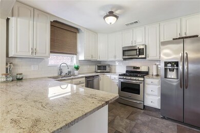 Granite countertops and stainless steel appliances