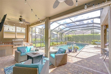 Unwind in your private oasis, complete with a stunning enclosed pool and a cozy sitting area perfect for entertaining or simply savoring the sunset.