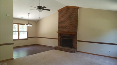 Entrance View - Living Room and Dining Area