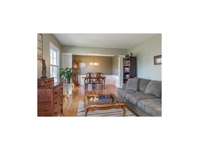 Living room and view of dining room. Beautiful woo