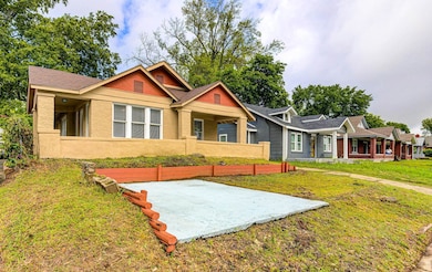 View of front of property with brick siding