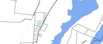 Property outline in blue.  Road runs along souther