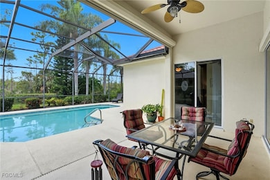 Swimming pool featuring a patio, a ceiling fan, a lanai, and outdoor dining space