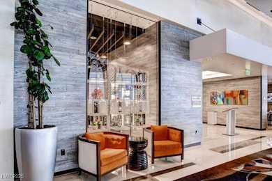 Common area with a high ceiling