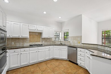 Kitchen featuring stainless steel appliances, whi