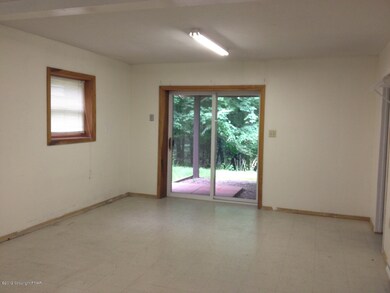 family room with sliders