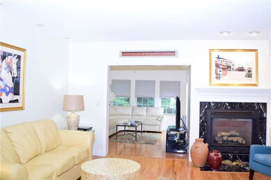 Living area open to 4 season sunroom