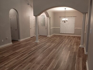 Unfurnished dining area with ornamental molding, d