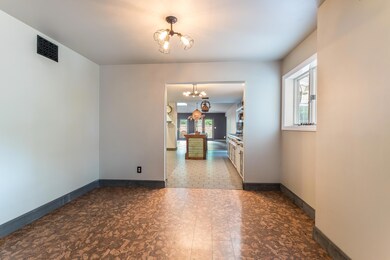 Dining Room With Easy Access to Kitchen
