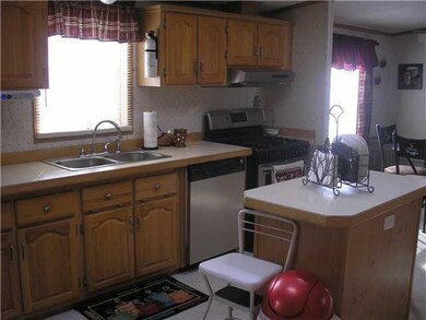 Kitchen Stainless steel appliances highlight this 