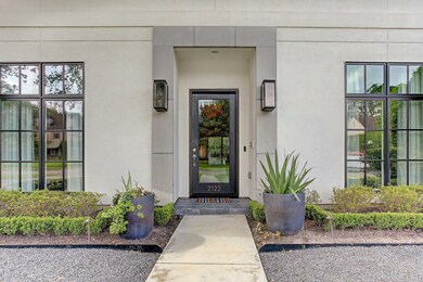 
The front door welcomes you into this well-appointed contemporary home.

