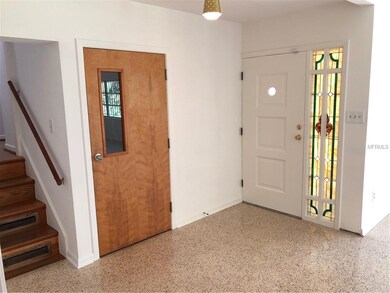 Inside foyer front door on right, door to lower level office, laundry &1/2 bath, garage in middle, Stairs to 2nd floor bedrooms