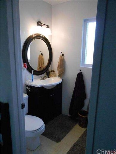 New sink vanity, mirror, and lighting.