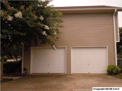 PLENTY OF SPACE IN THIS TWO CAR GARAGE. THERE IS ALSO TONS OF PARKING SPACE WITH THIS EXTRA LONG DRIVEWAY.
