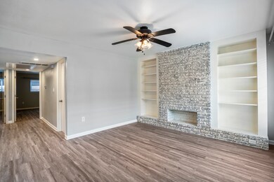 Abundant natural light fills the room, highlightin