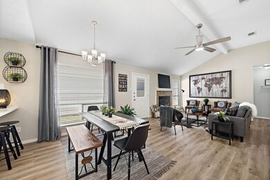 Beautiful durable wood-grained laminate flooring throughout main living areas and hallways.