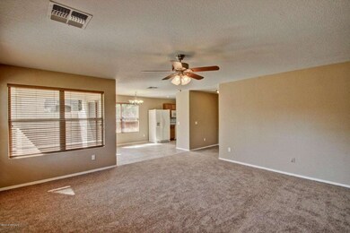 Great room with new carpet and paint