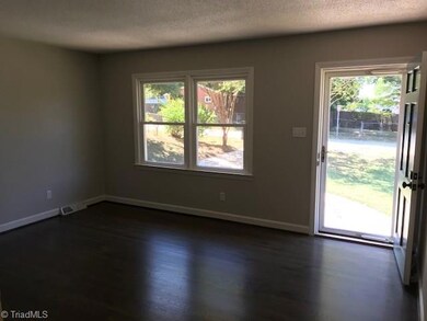 Living room with gorgeous refinished hardwoods!