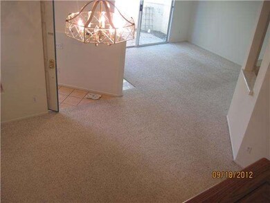 Living room has fireplace and  leads to enclosed p