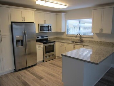 4407 Woodstock Dr unit B, West Palm Beach, FL 33409 - photo 2