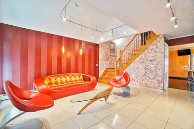 (4) Entry Foyer Sitting Room