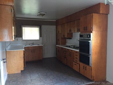 Large kitchen with plenty of cabinets and counter