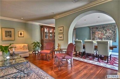 Living Room to open  Formal Dining Room enhanced b