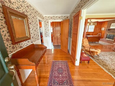 Hallway with ornamental molding, light wood-style