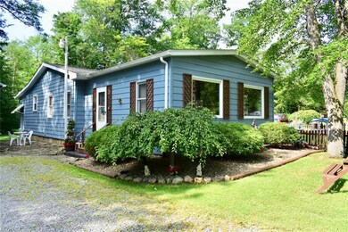 Another view of the L-shaped ranch styled home. Cl