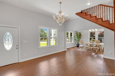Welcoming entry, all new  window sand flooring.