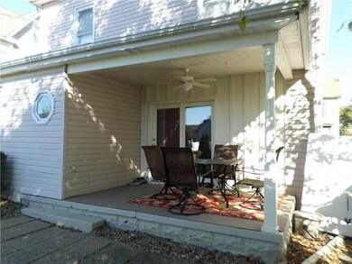 Exterior Back. Rear covered back porch with privat