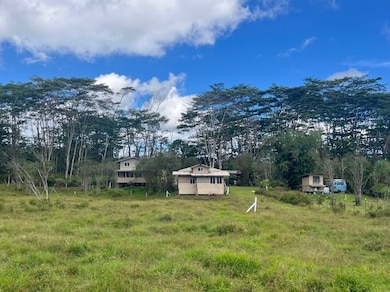 Two dwellings, a bath house and a bus/guest room on 10 acres!