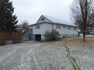 Rear of home with easy access to basement and a sm