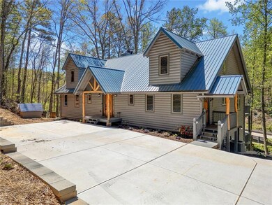 View of front of home featuring metal roof