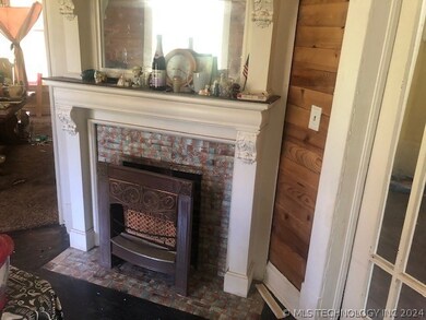 Gas fireplace insert in formal Living room