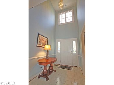 Foyer - Two-story foyer with ceramic tile floor, c