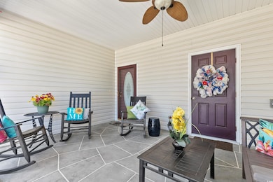 Entrance to property with ceiling fan
