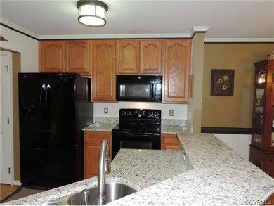 There is a pantry and walk-in laundry next to the 