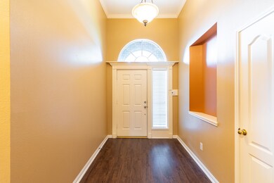 Foyer of home with niche.