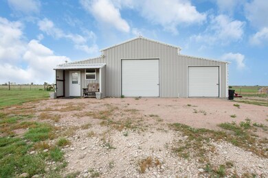 Detached garage with fence