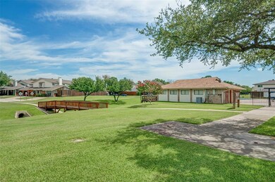 Just seconds away from the community pool, guest parking, and view of the lush greenbelt!