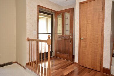 Entry With Teak Floors