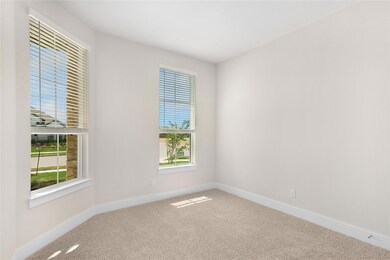 Carpeted spare room with healthy amount of natura