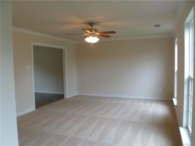 Living Room in the front of home - New carpet, cei