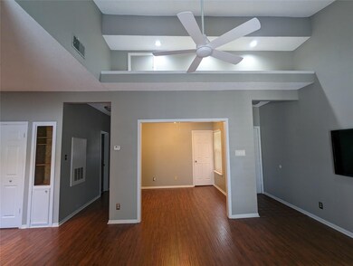 Unfurnished living room with wood finished floors