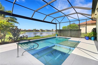 View of swimming pool with a patio, an in ground h