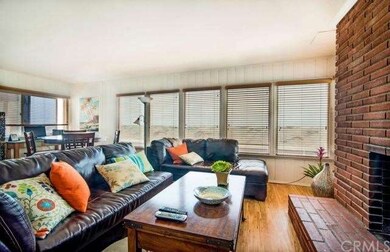Apt A - The living area looks out onto the beach &
