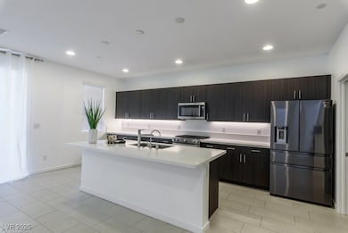 Kitchen featuring appliances with stainless steel