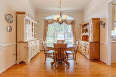 Formal Dining Room with Wood Floors, Large Window